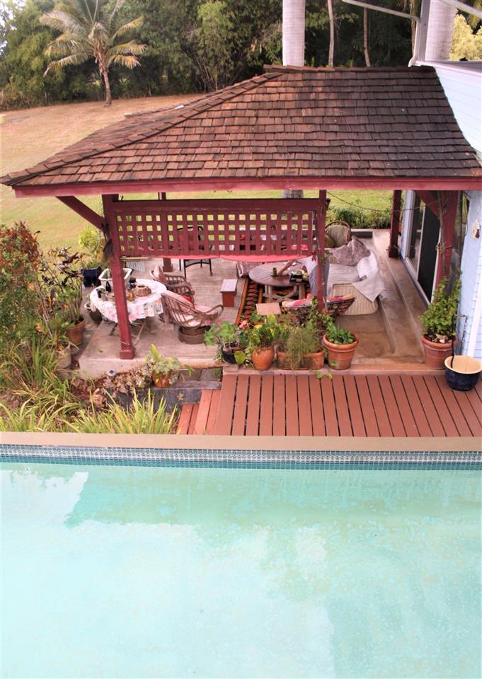 941 Hog Back Road Haiku, HI 96708 - Photo 5 of 18 a view of swimming pool with a yard