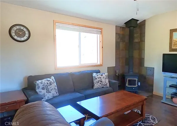 a kitchen with wooden cabinets and a sink