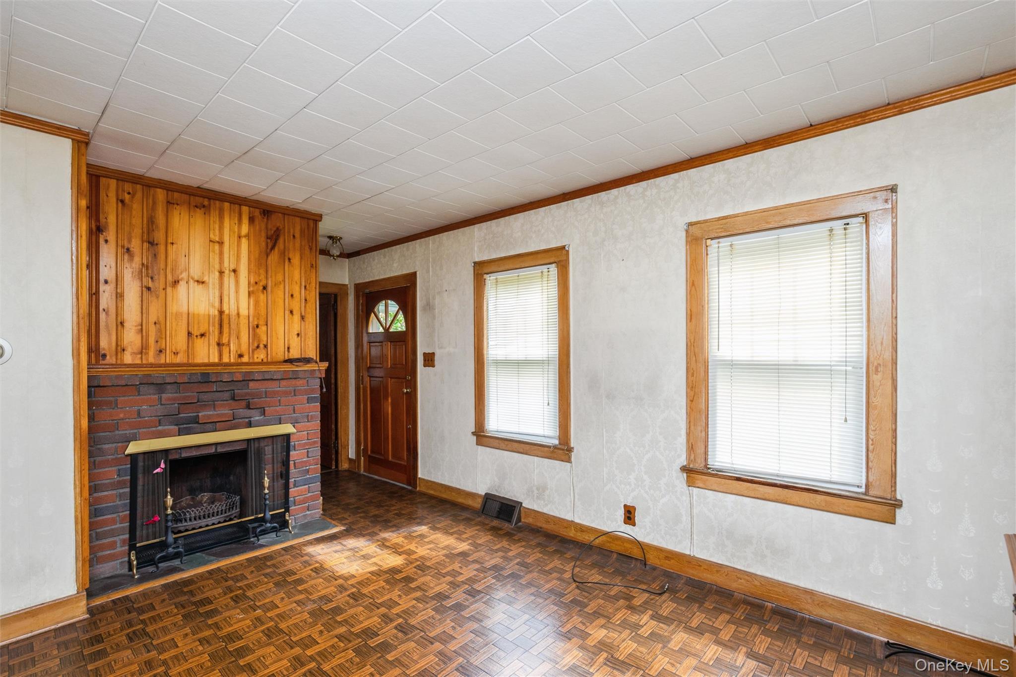 10 Laurel Road Ronkonkoma, NY 11779 - Photo 3 of 21 a view of an empty room with window and fire place