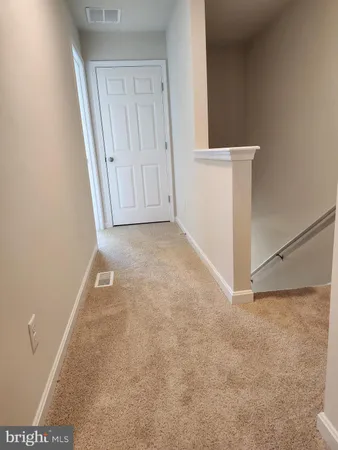 a view of a room with an empty space