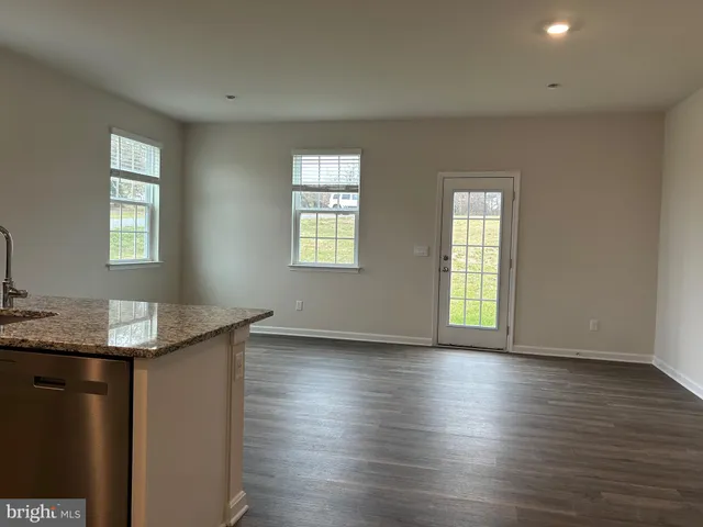 a view of a room with an empty space