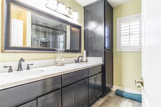 an aerial view of a house with a city view