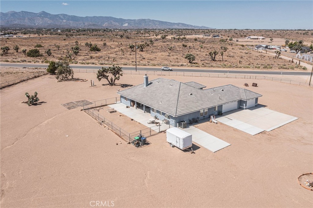 9735 Elsinore Road Oak Hills, CA 92344 - Photo 49 of 64 an aerial view of a house with a ocean view