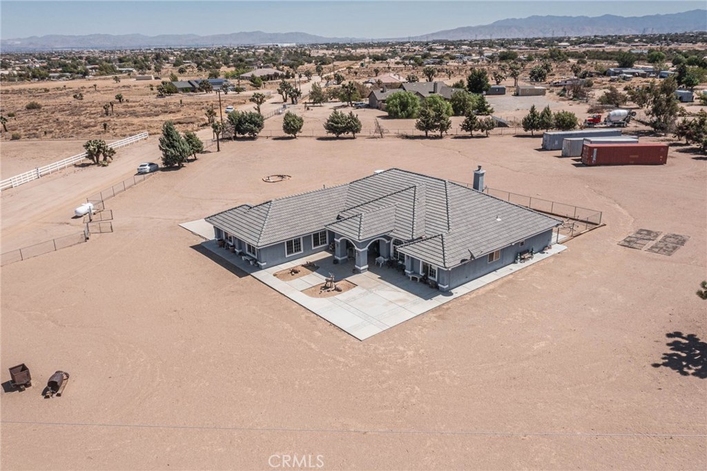 9735 Elsinore Road Oak Hills, CA 92344 - Photo 50 of 64 an aerial view of a house with a yard
