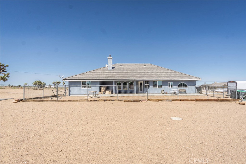 9735 Elsinore Road Oak Hills, CA 92344 - Photo 51 of 64 a house with a outdoor space
