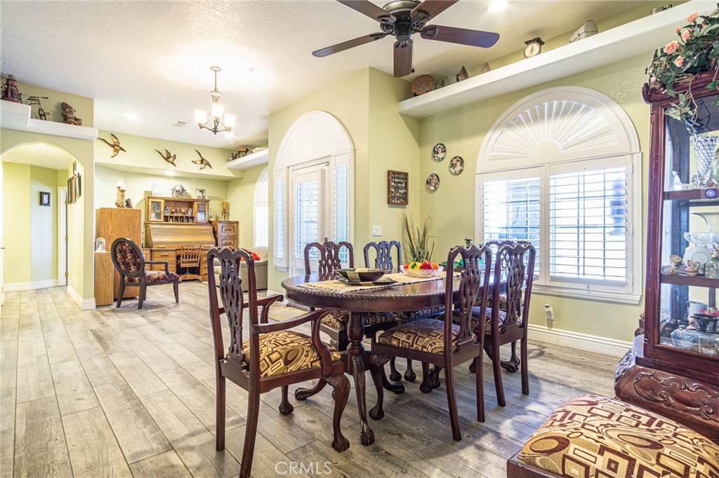 9735 Elsinore Road Oak Hills, CA 92344 - Photo 8 of 64 a view of a dining room with furniture