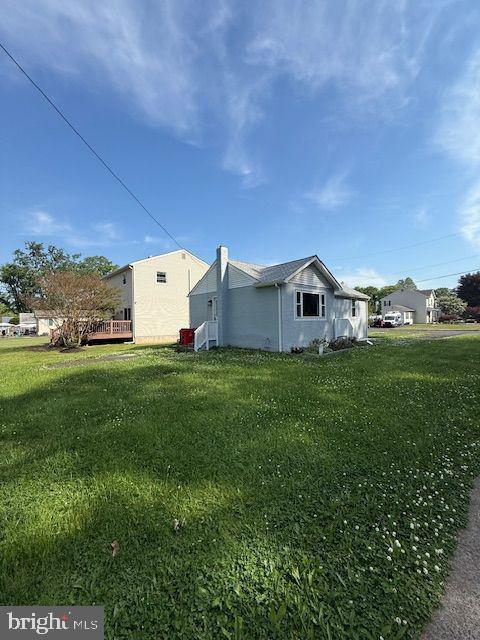 306 Grape Street Warminster, PA 18974 - Photo 24 of 25 a backyard of a house with lots of green space and garden view