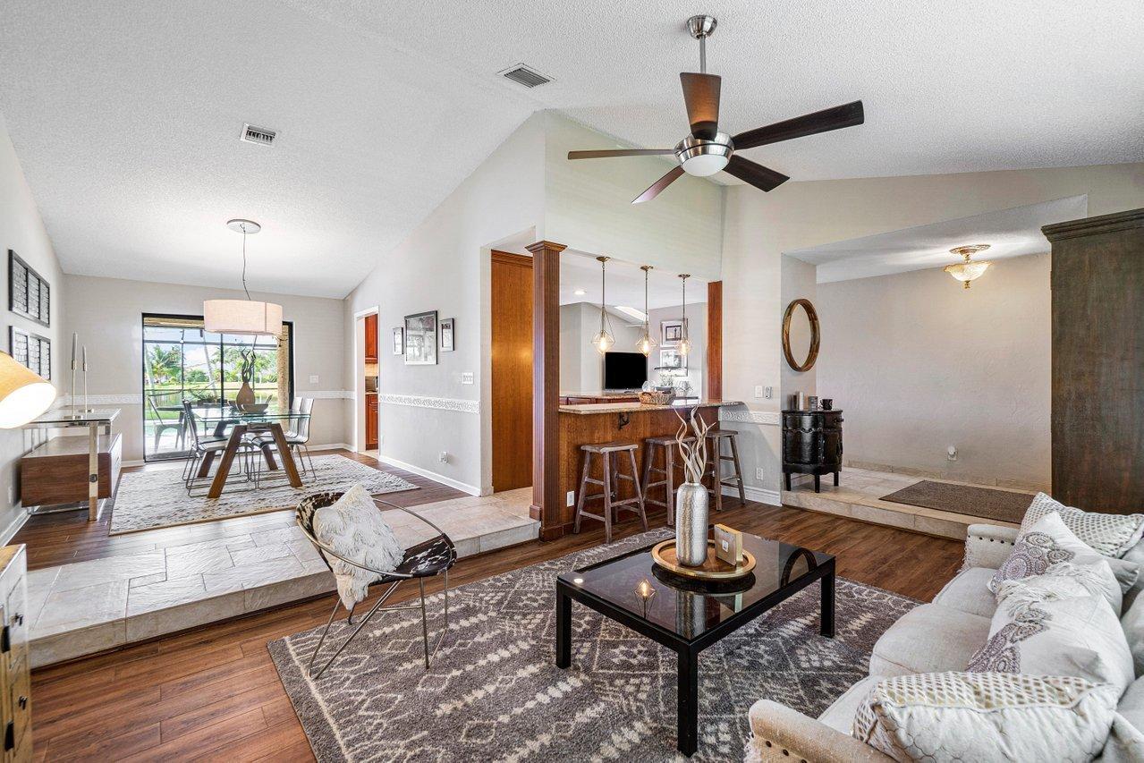 22250 Martella Avenue Boca Raton, FL 33433 - Photo 13 of 45 a living room with furniture and wooden floor