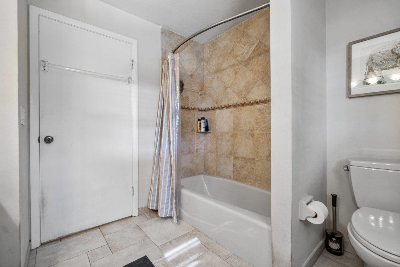 22250 Martella Avenue Boca Raton, FL 33433 - Photo 25 of 45 a bathroom with a toilet and a shower