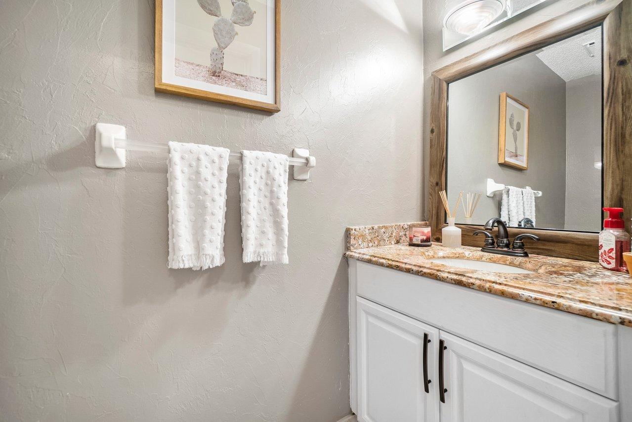 22250 Martella Avenue Boca Raton, FL 33433 - Photo 26 of 45 a bathroom with a sink and a mirror