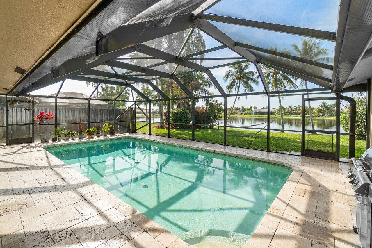 22250 Martella Avenue Boca Raton, FL 33433 - Photo 28 of 45 a view of a backyard