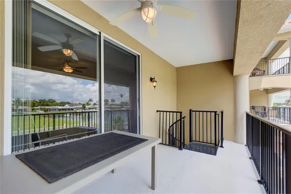 a view of balcony with a potted plant