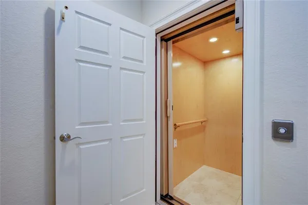 a view of a swimming pool with a lounge chairs