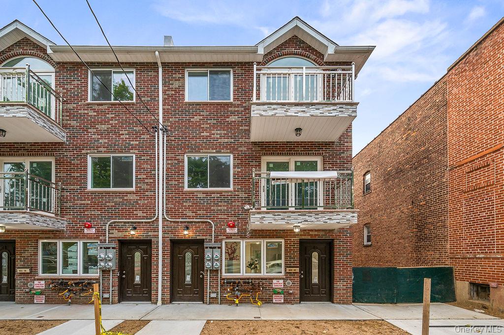 106-05 49th Avenue Queens, NY 11368 - Photo 1 of 39 a front view of a building with a street