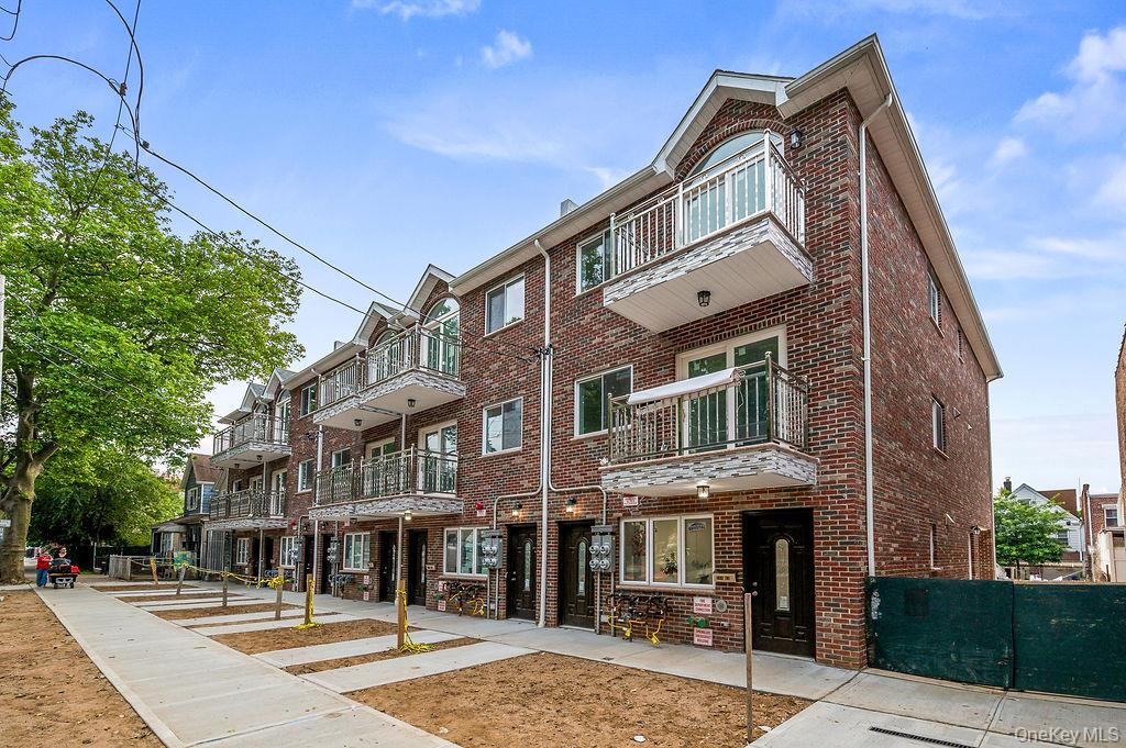 106-05 49th Avenue Queens, NY 11368 - Photo 2 of 39 a front view of a building with street view