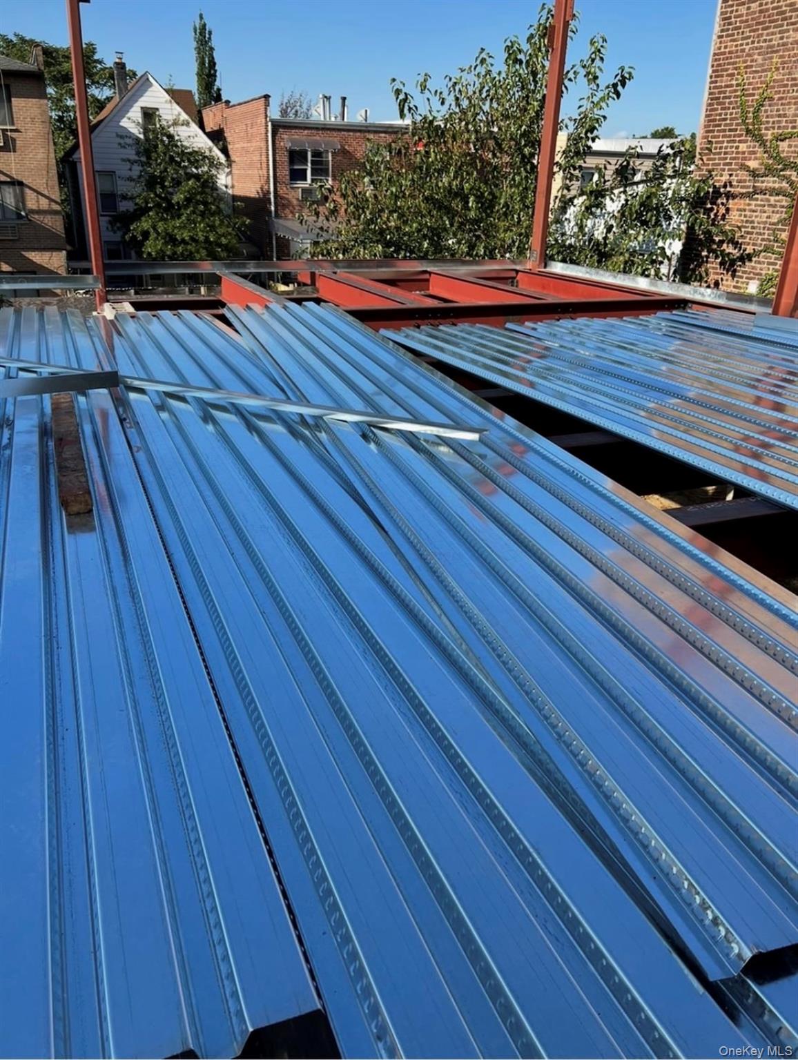 106-05 49th Avenue Queens, NY 11368 - Photo 38 of 39 a view of outdoor space with wooden floor