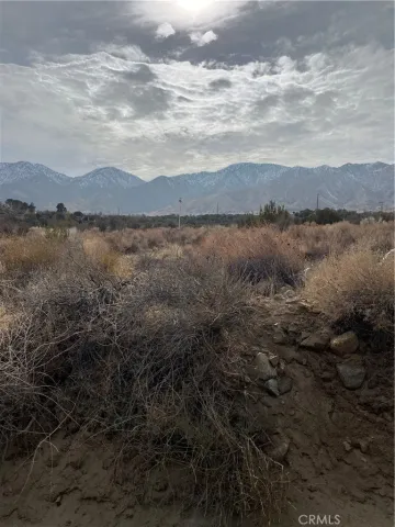a view of lake with mountain
