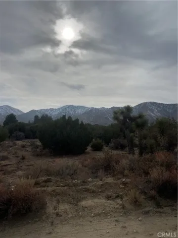 a view of mountain with lake view