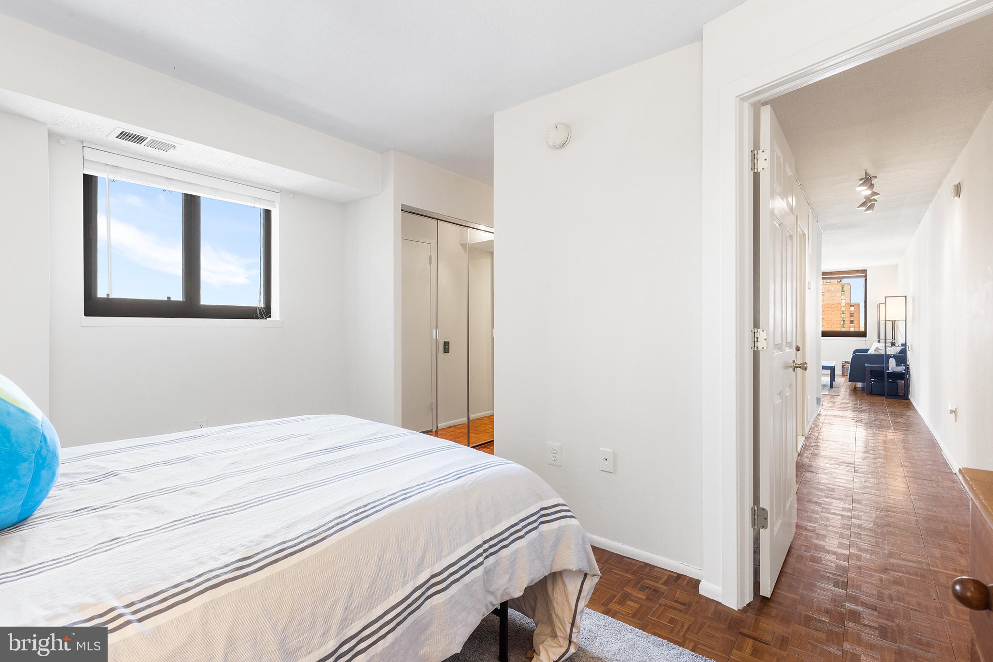 1420 Locust Street, Unit 29J Philadelphia, PA 19102 - Photo 28 of 30 a bedroom with a bed and a view of bathroom