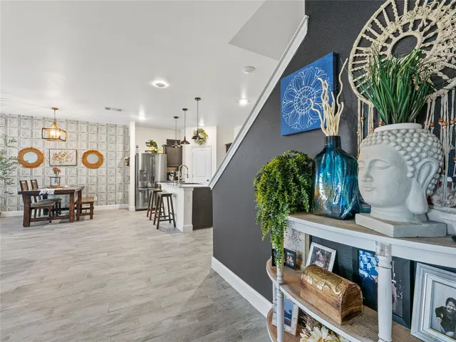 a living room with furniture and furniture