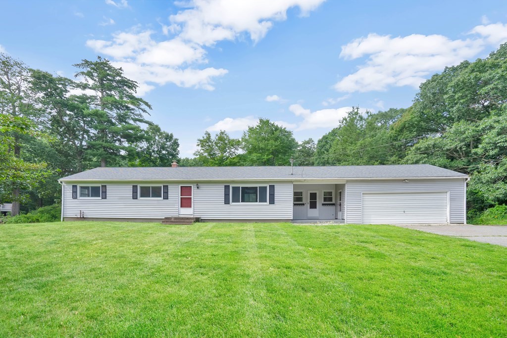 316 Burlingame Road Palmer, MA 01069 - Photo 1 of 31 a view of house with a big yard and large trees