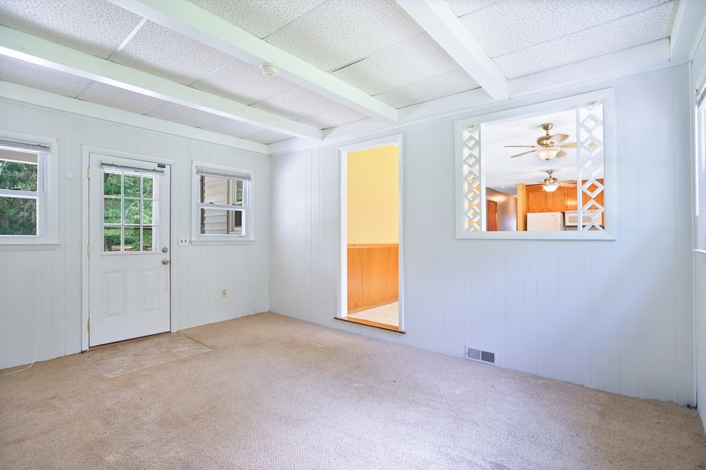 316 Burlingame Road Palmer, MA 01069 - Photo 12 of 31 an empty room with windows