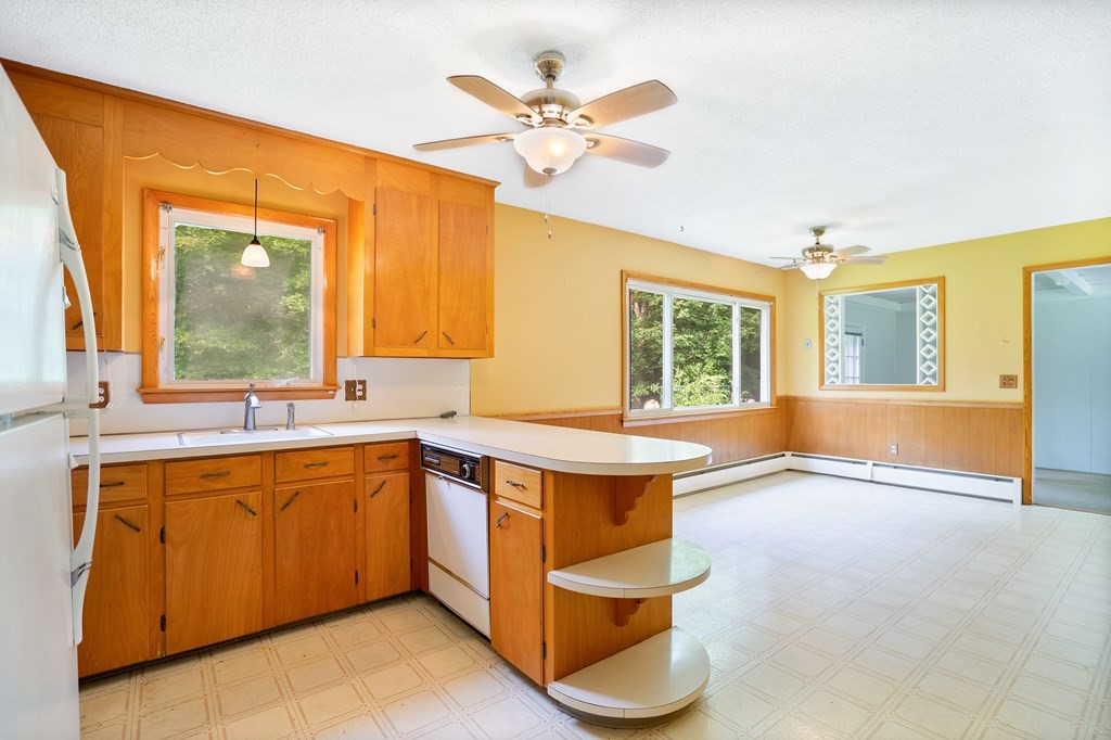 316 Burlingame Road Palmer, MA 01069 - Photo 17 of 31 a living room with stainless steel appliances granite countertop furniture and a large window
