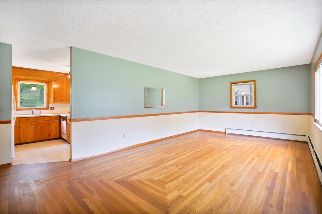 316 Burlingame Road Palmer, MA 01069 - Photo 20 of 31 a view of a room with wooden floor and a sink