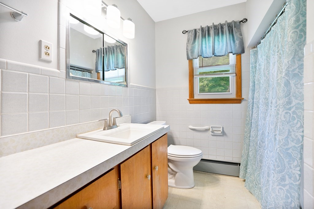 316 Burlingame Road Palmer, MA 01069 - Photo 23 of 31 a bathroom with a sink toilet and shower