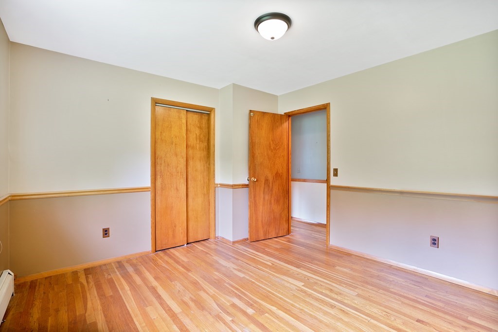 316 Burlingame Road Palmer, MA 01069 - Photo 25 of 31 a view of room with wooden floor