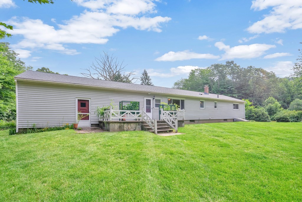316 Burlingame Road Palmer, MA 01069 - Photo 7 of 31 a view of a house with backyard and sitting area