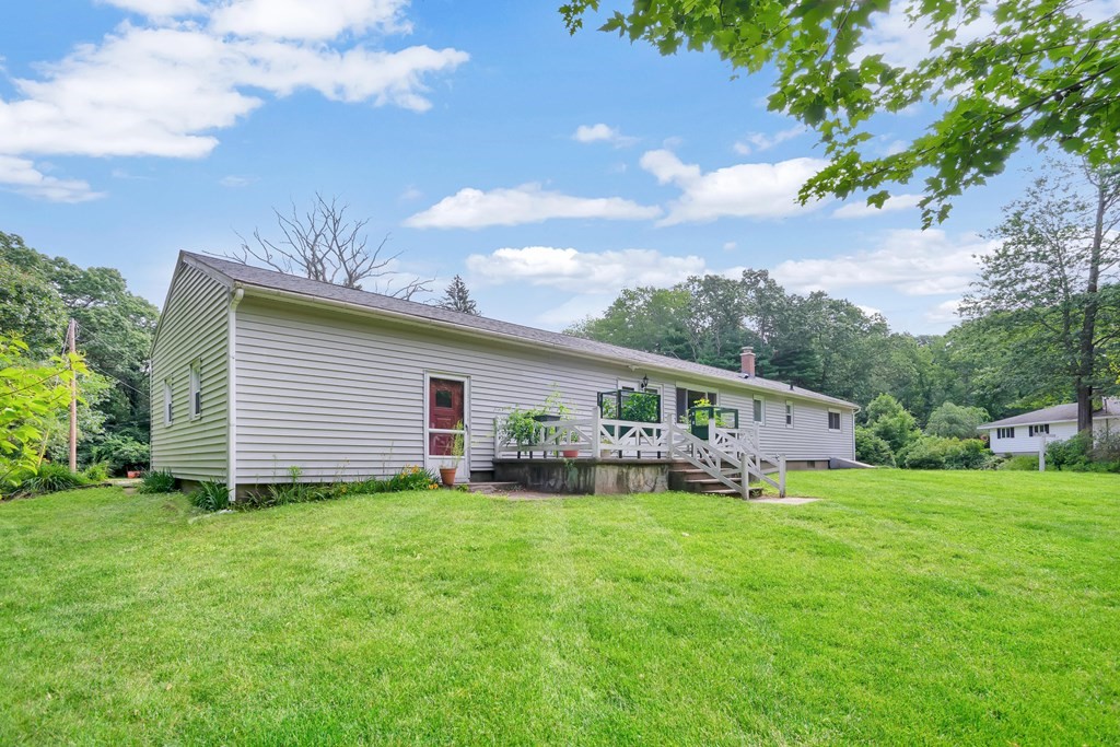 316 Burlingame Road Palmer, MA 01069 - Photo 8 of 31 a view of a backyard with plants and a garden