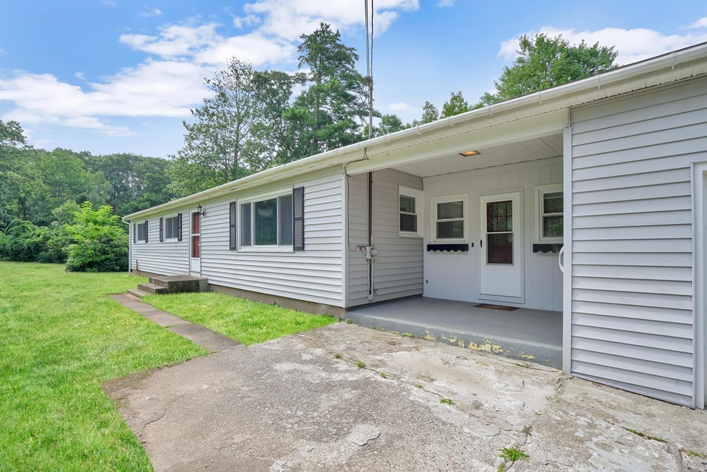 316 Burlingame Road Palmer, MA 01069 - Photo 9 of 31 a view of a house with a backyard