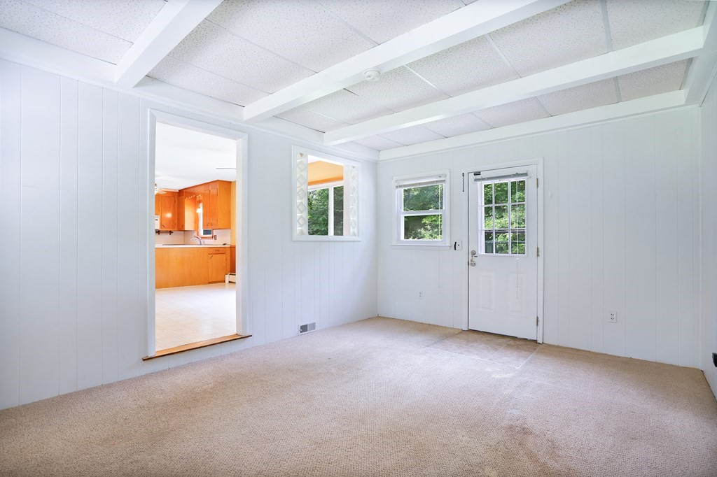 316 Burlingame Road Palmer, MA 01069 - Photo 10 of 31 an empty room with windows