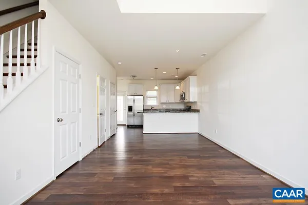 a view of kitchen with wooden floor