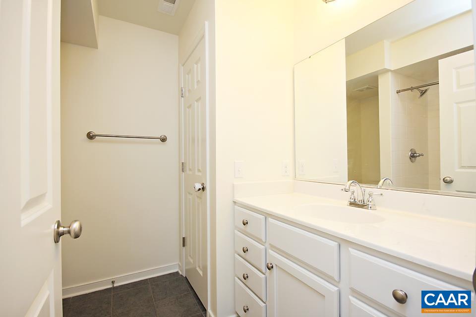 609 Mornington Lane Crozet, VA 22932 - Photo 9 of 17 a bathroom with a sink and a mirror