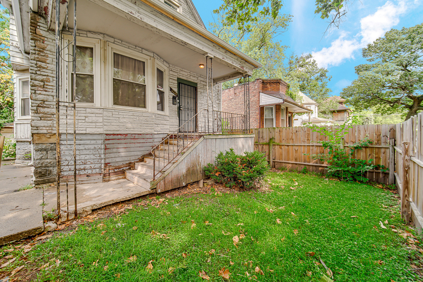 12220 South Normal Avenue Chicago, IL 60628 - Photo 5 of 22 a view of backyard with a garden and plants