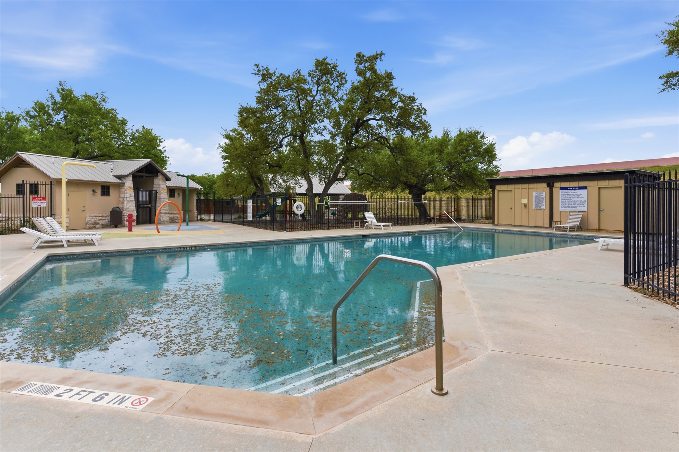 2409 Muzzie Lane Leander, TX 78641 - Photo 30 of 33 a view of a house with pool and chairs