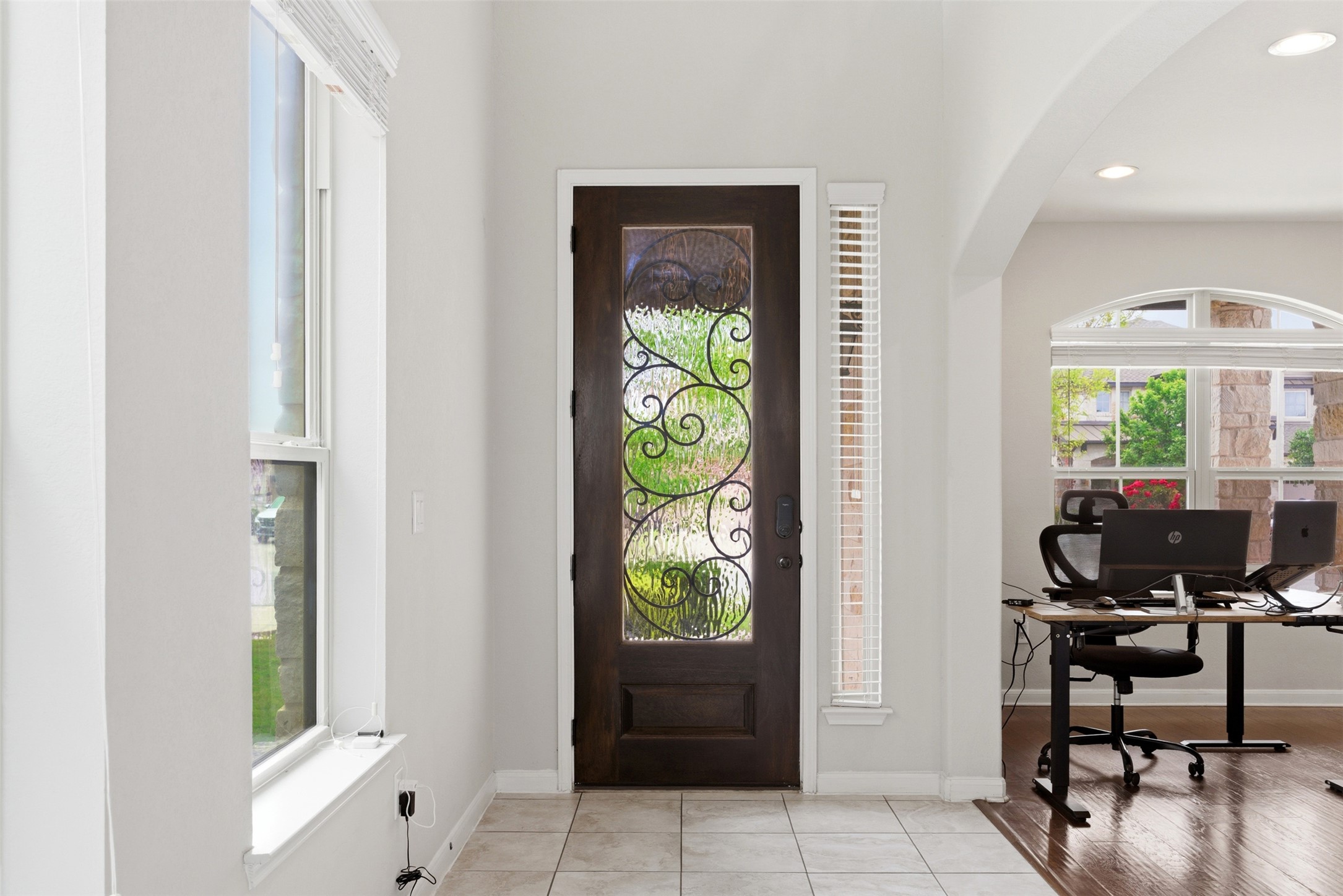 2409 Muzzie Lane Leander, TX 78641 - Photo 3 of 33 a view of a workspace with furniture and a window
