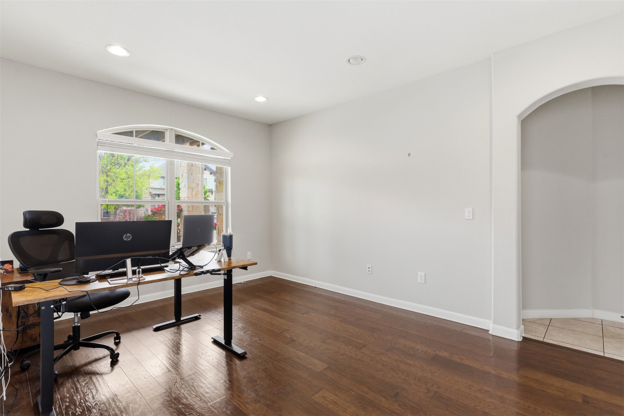 2409 Muzzie Lane Leander, TX 78641 - Photo 5 of 33 a view of a workspace with furniture and a window
