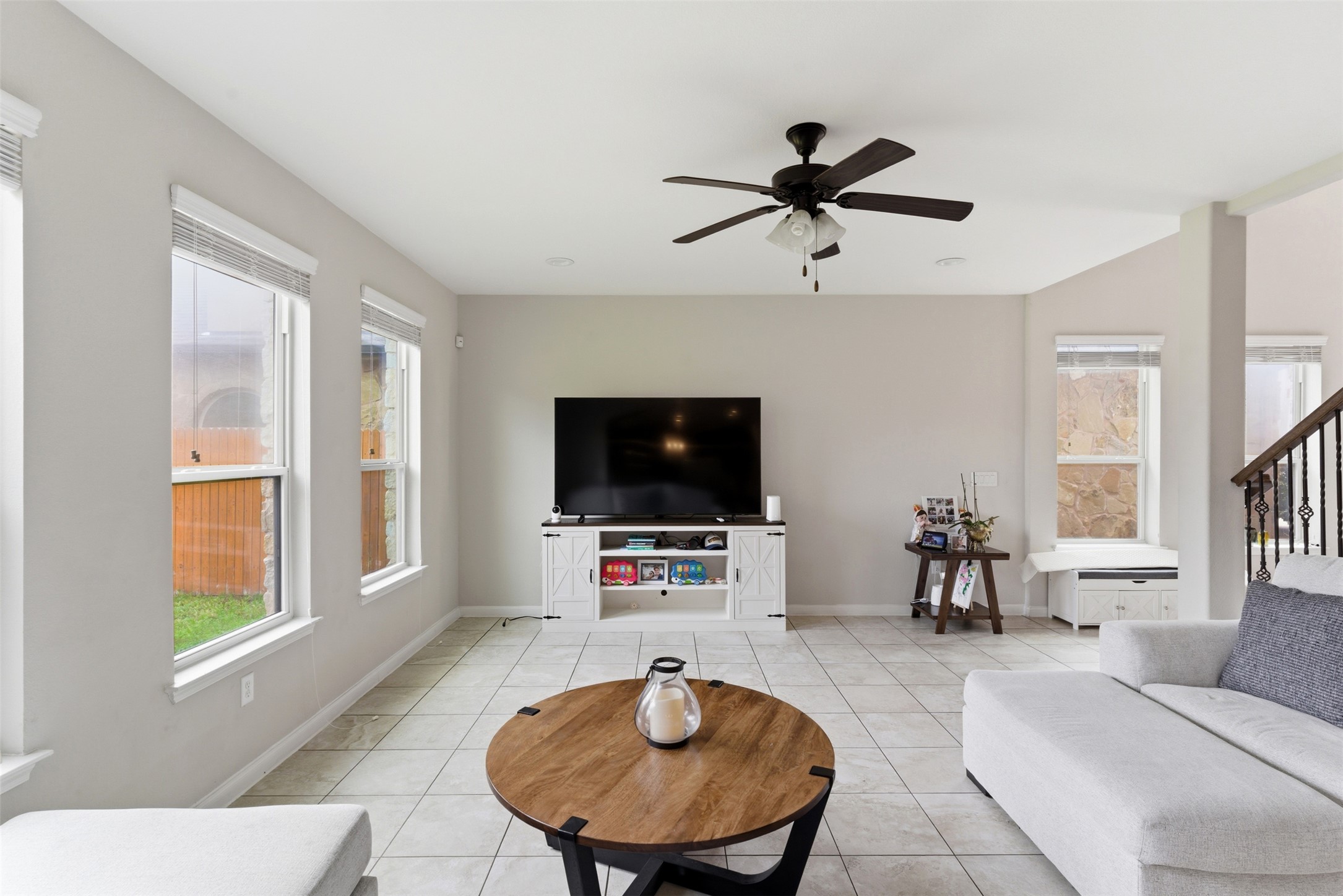 2409 Muzzie Lane Leander, TX 78641 - Photo 7 of 33 a living room with furniture and a flat screen tv