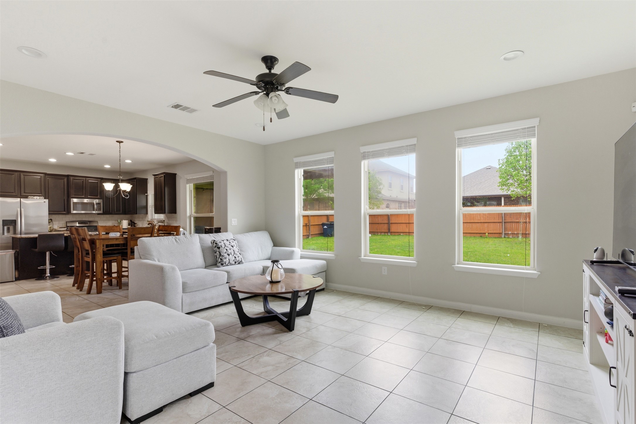2409 Muzzie Lane Leander, TX 78641 - Photo 8 of 33 a living room with furniture and a large window