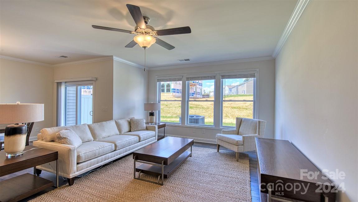 31 Ravens Rdg Road Hendersonville, NC 28792 - Photo 8 of 38 a living room with furniture and a large window