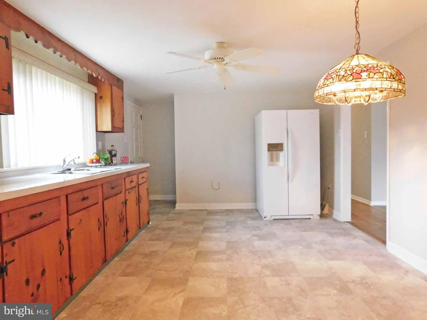 926 Bent Road Hatfield, PA 19440 - Photo 6 of 24 Kitchen access to Basement and Enclosed Porch