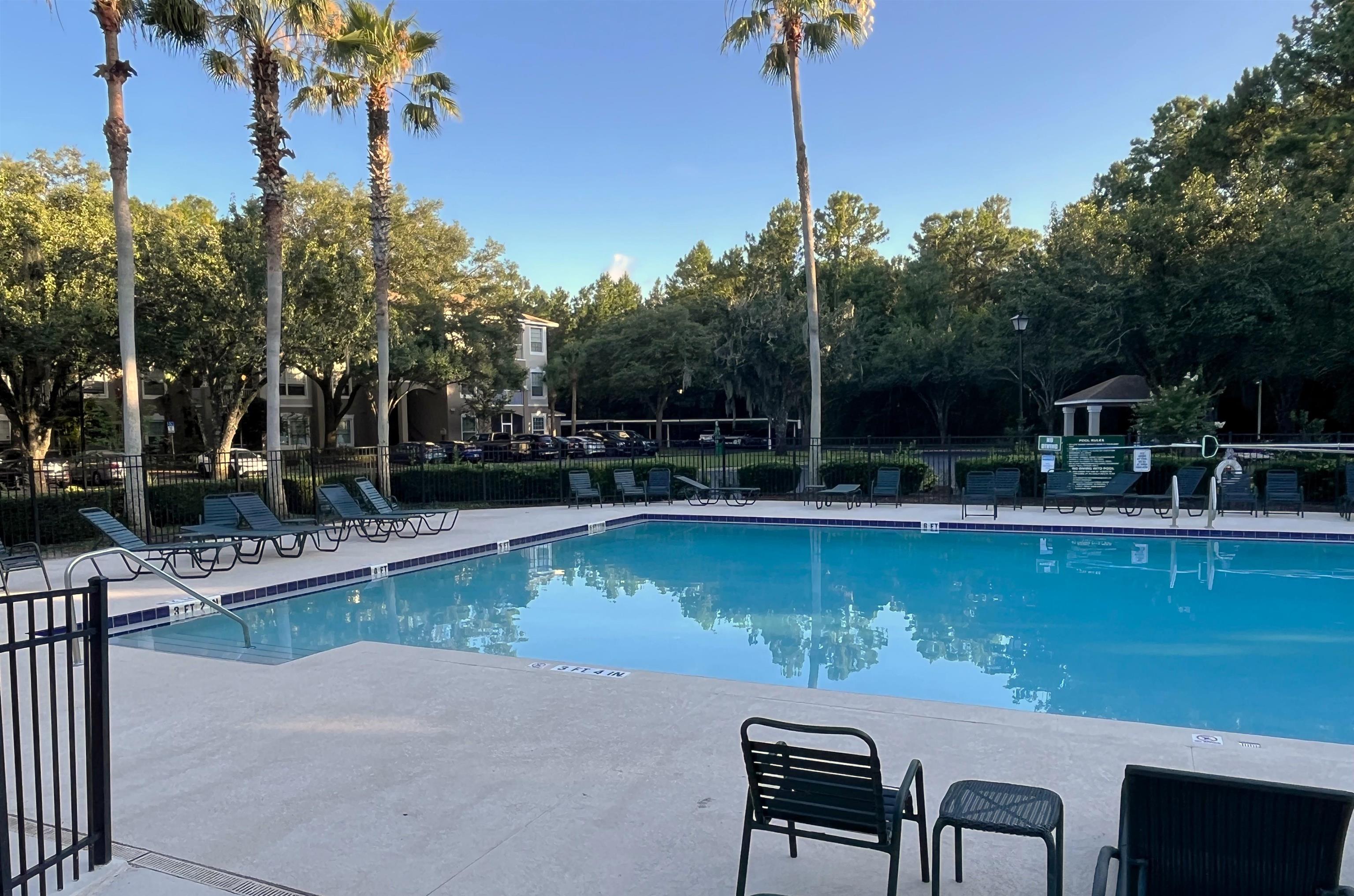 10550 Baymeadows Road, Unit 425 Jacksonville, FL 32256 - Photo 11 of 15 a view of a chairs and table in the patio