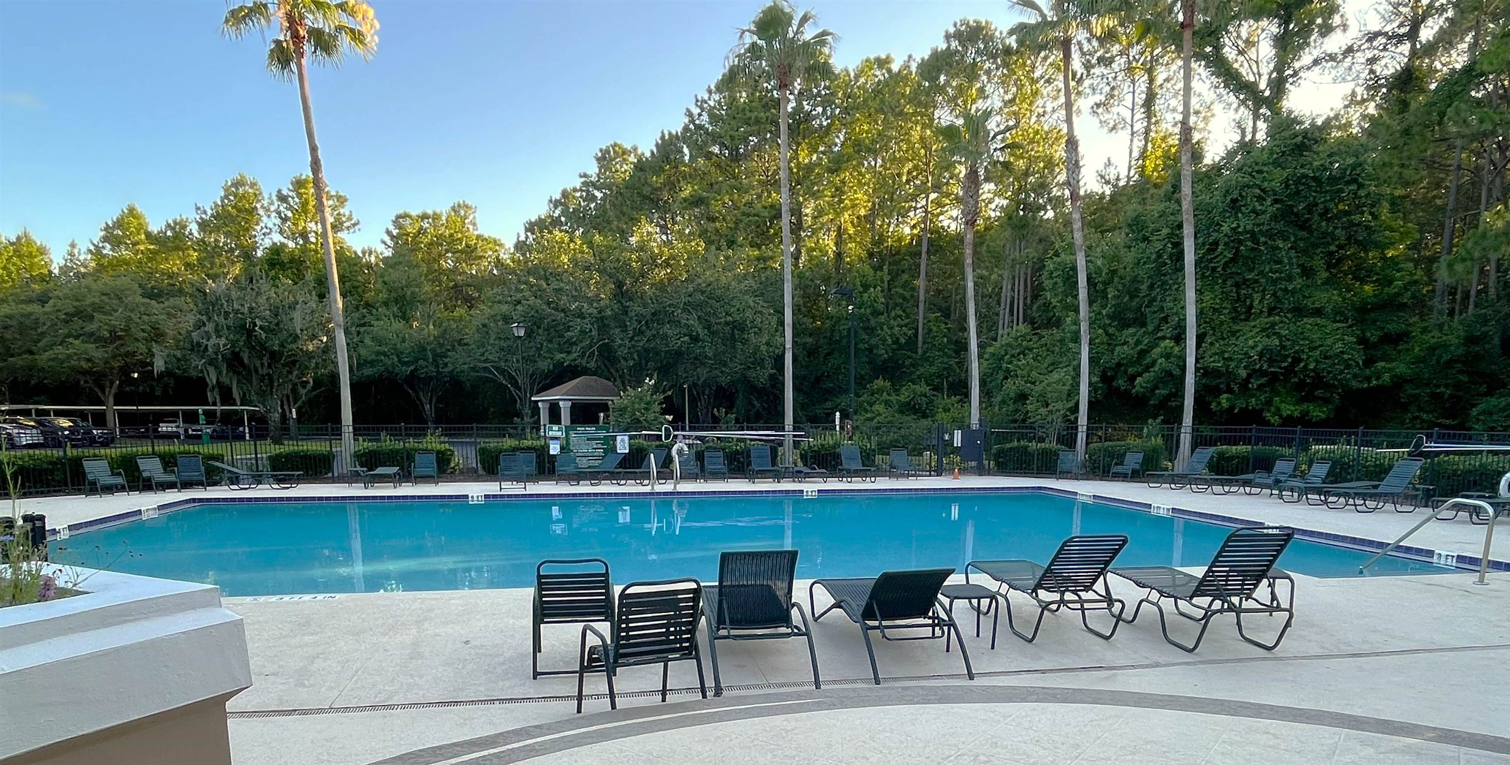 10550 Baymeadows Road, Unit 425 Jacksonville, FL 32256 - Photo 10 of 15 a view of a swimming pool with chairs