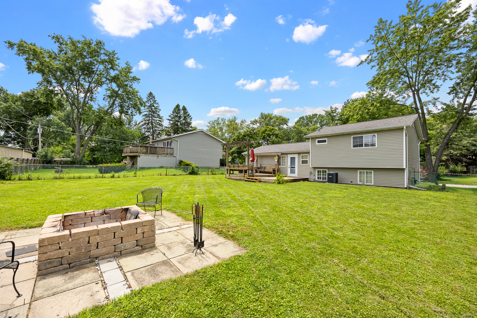 148 Bedford Road Bolingbrook, IL 60440 - Photo 7 of 32 a view of a house with a big yard