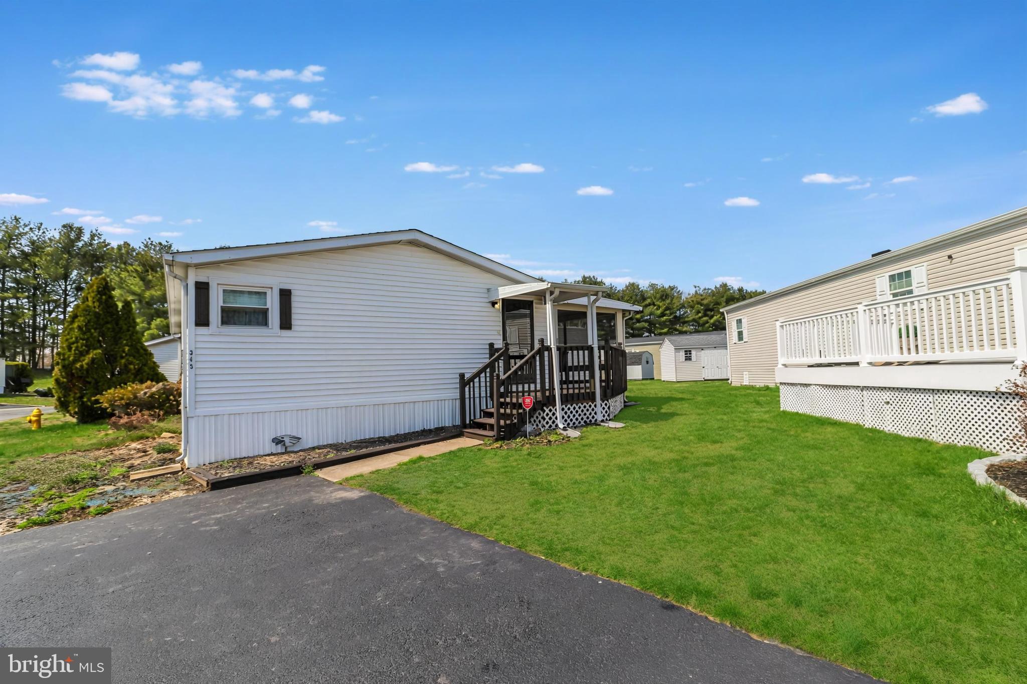 Front Entrance with access to enclosed porch