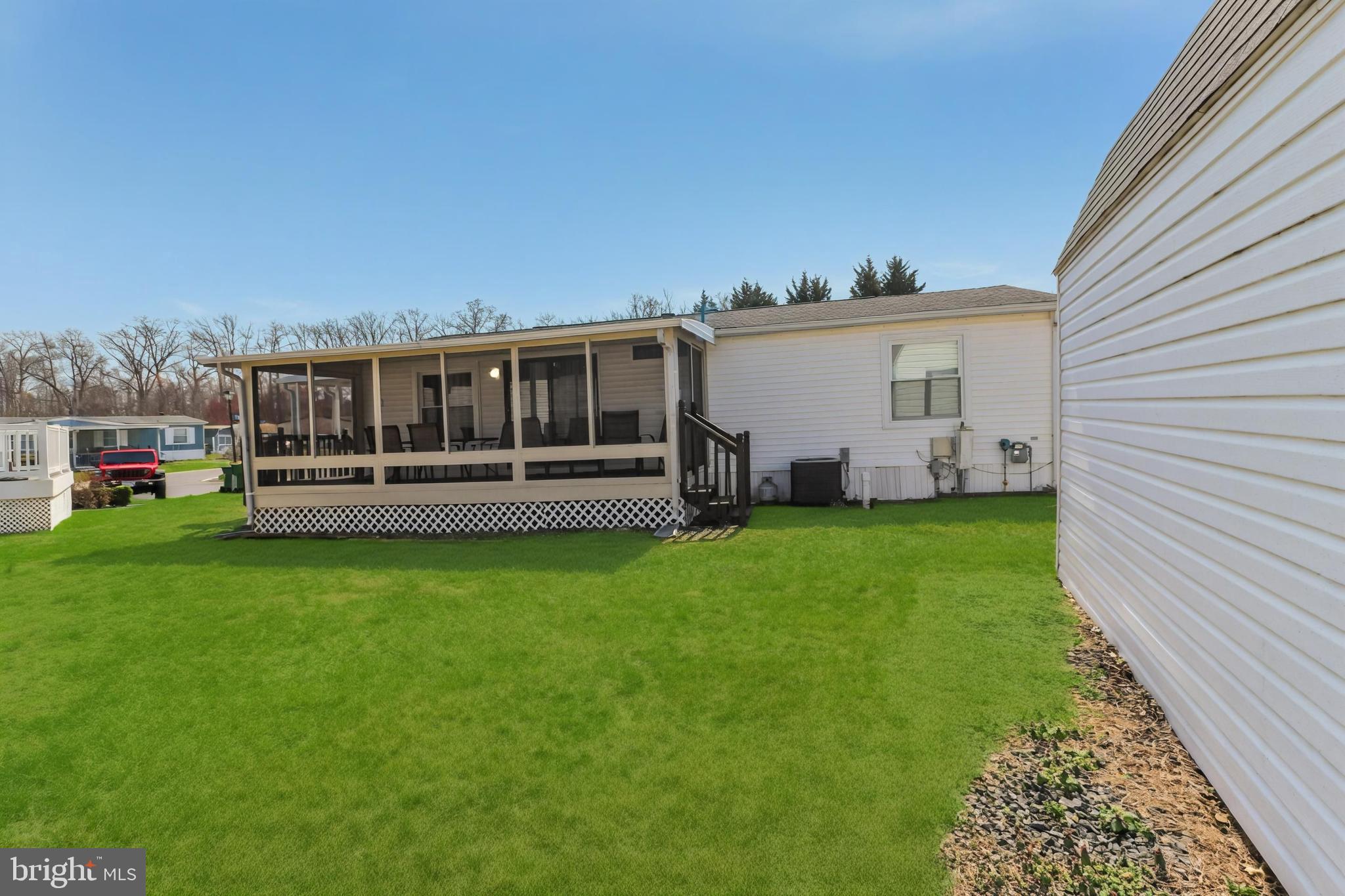 345 Jacobs Loop Bear, DE 19701 - Photo 5 of 19 back of property facing enclosed porch