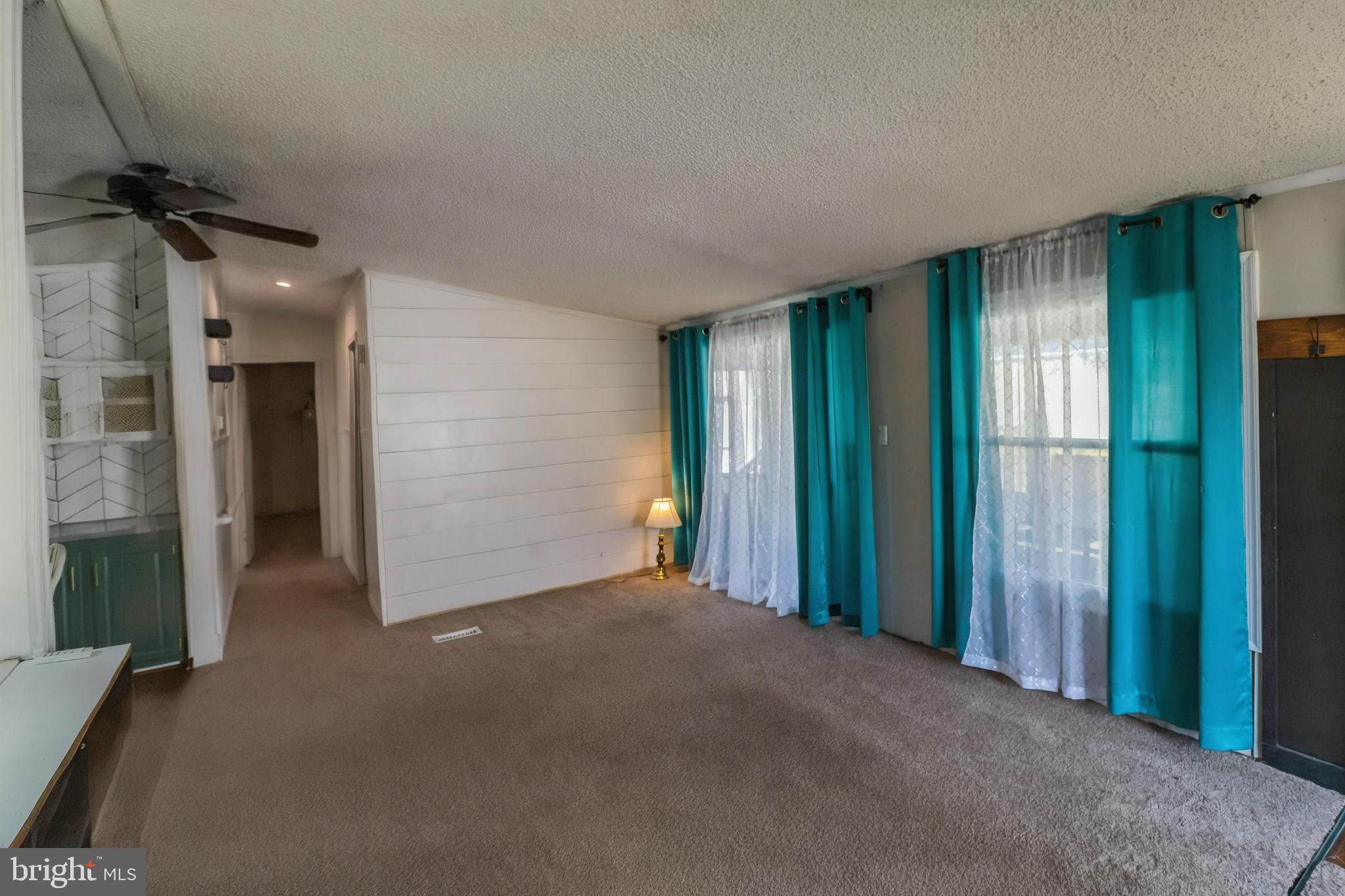 345 Jacobs Loop Bear, DE 19701 - Photo 6 of 19 living room connecting to enclosed porch